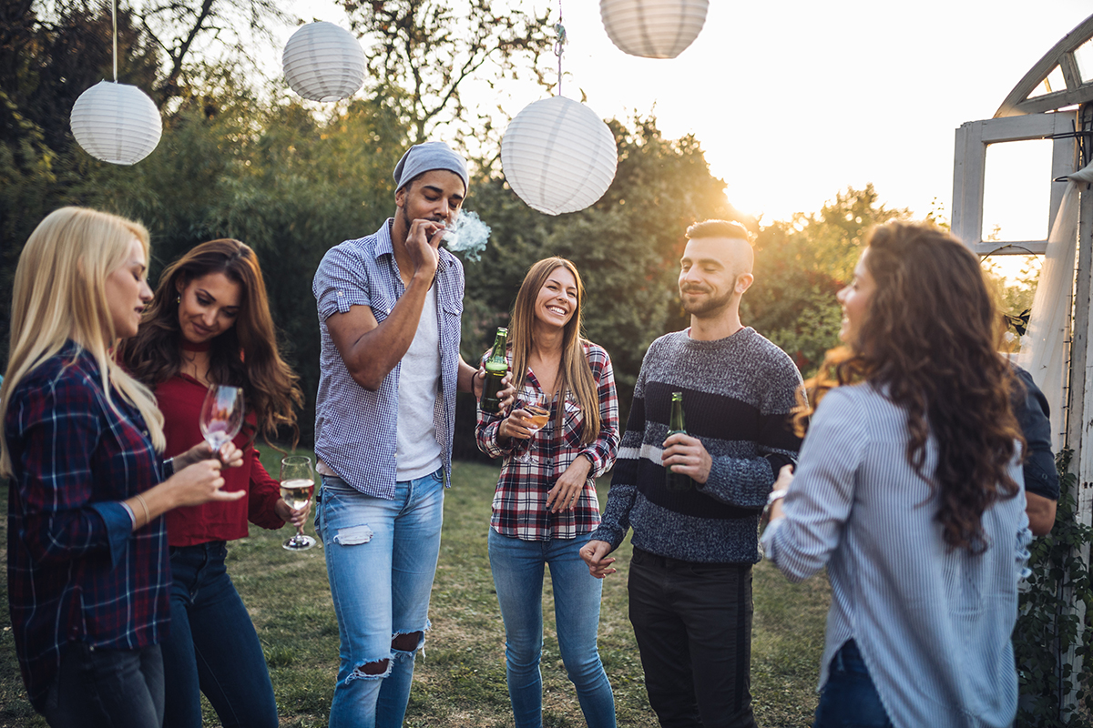 Young and mixed ethnicity group having fun together, having a party and a gathering, celebrating a birthday.