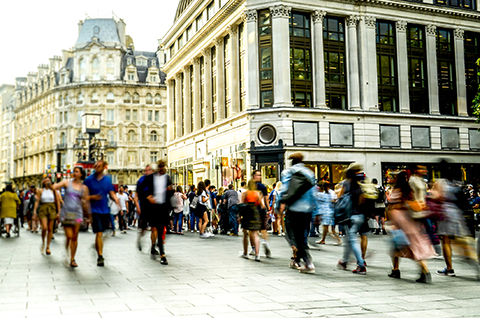 Motion blurred busy London west end street scene