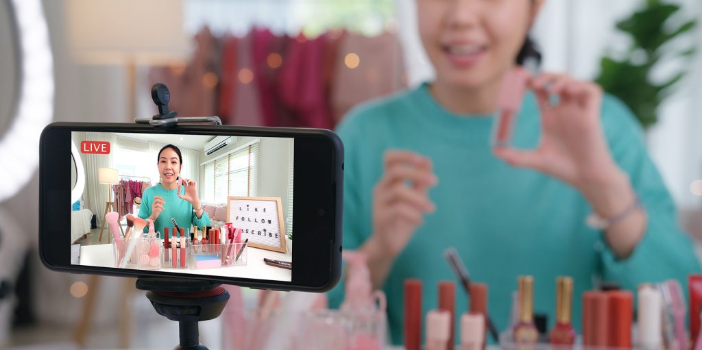 Asia woman micro influencer record live viral video camera at home studio. Happy fun talk speak advice review hobby in media. Vlogger selfie shoot enjoy work show smile teach like share app.